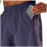 Short Deportivo Asics ROAD 2N1 7IN Gris Lavanda Hombre